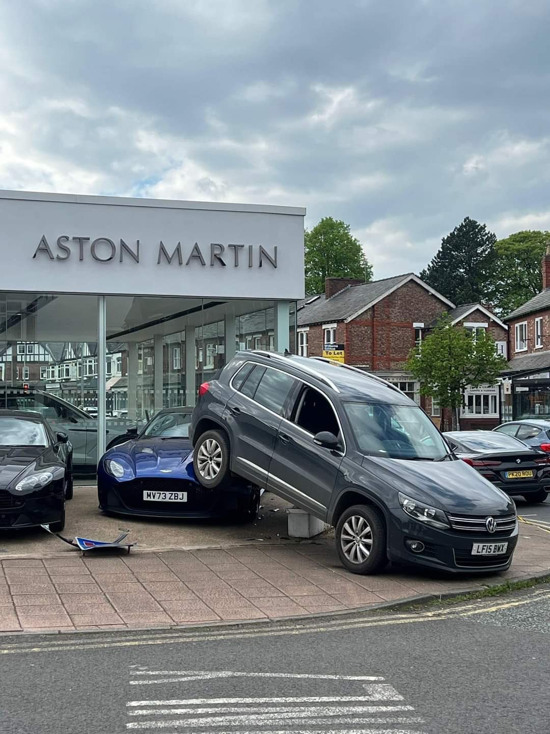 Aston Martin Dealership Crash